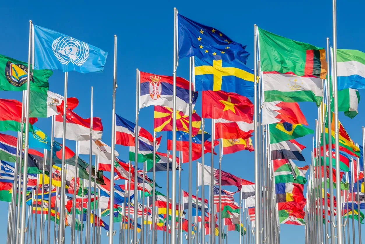 Flags of many countries symbolizing global document recognition and MOFA attestation service by notarypublic24.com for Ministry of Foreign Affairs legalization